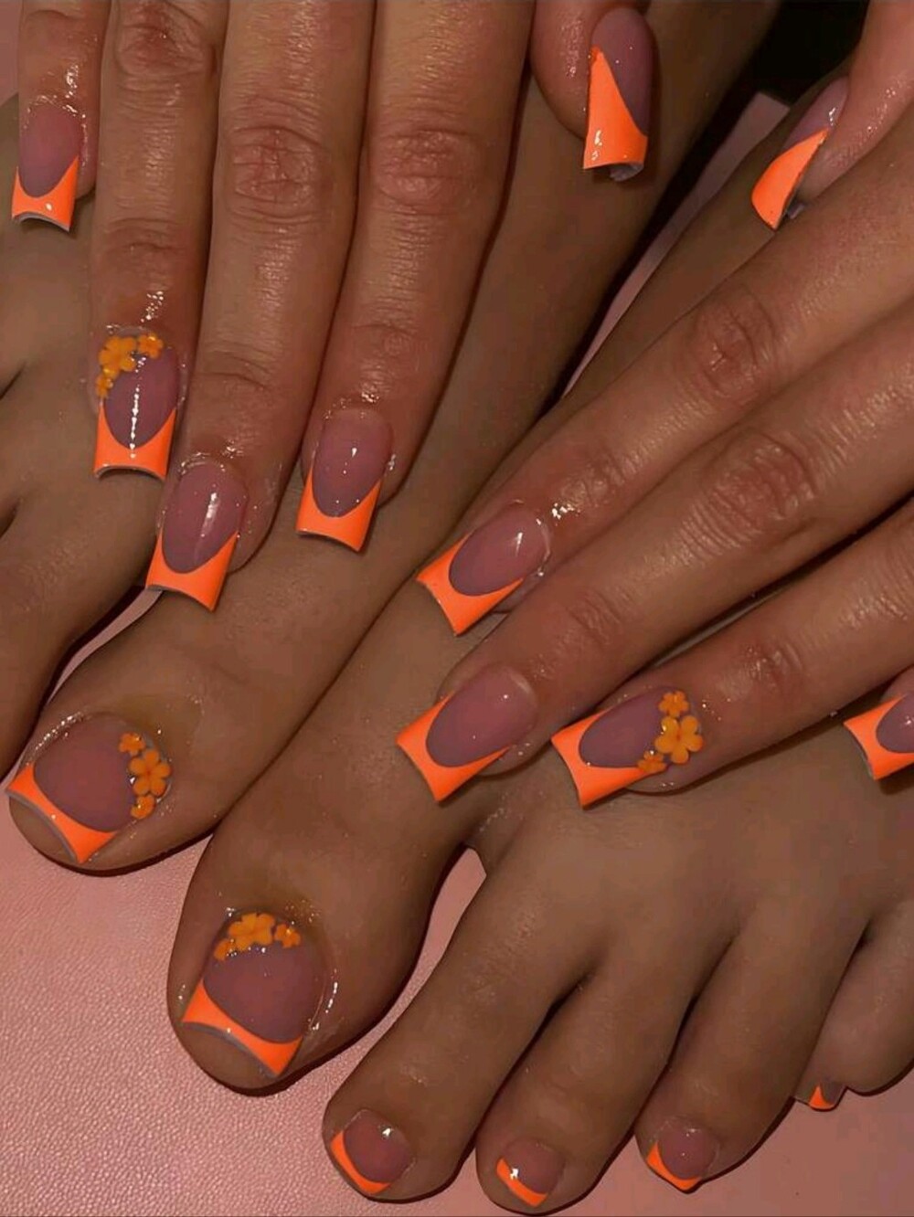 2/$22 Neon Orange French Tip Floral Accent Matching Finger And Toe Nail Design